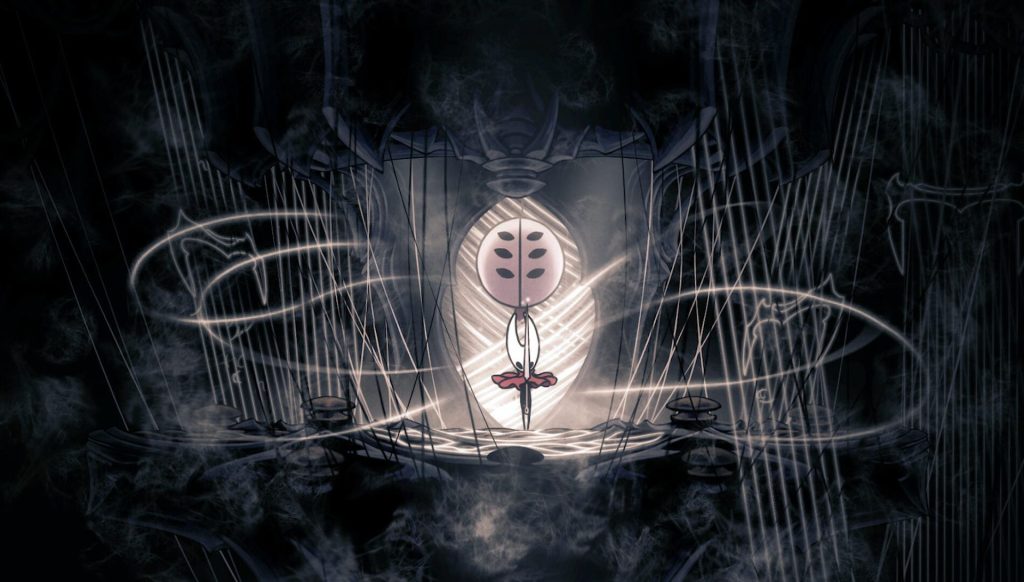 Close-up de Hornet com sua agulha, pronta para o combate em Hollow Knight Silksong.